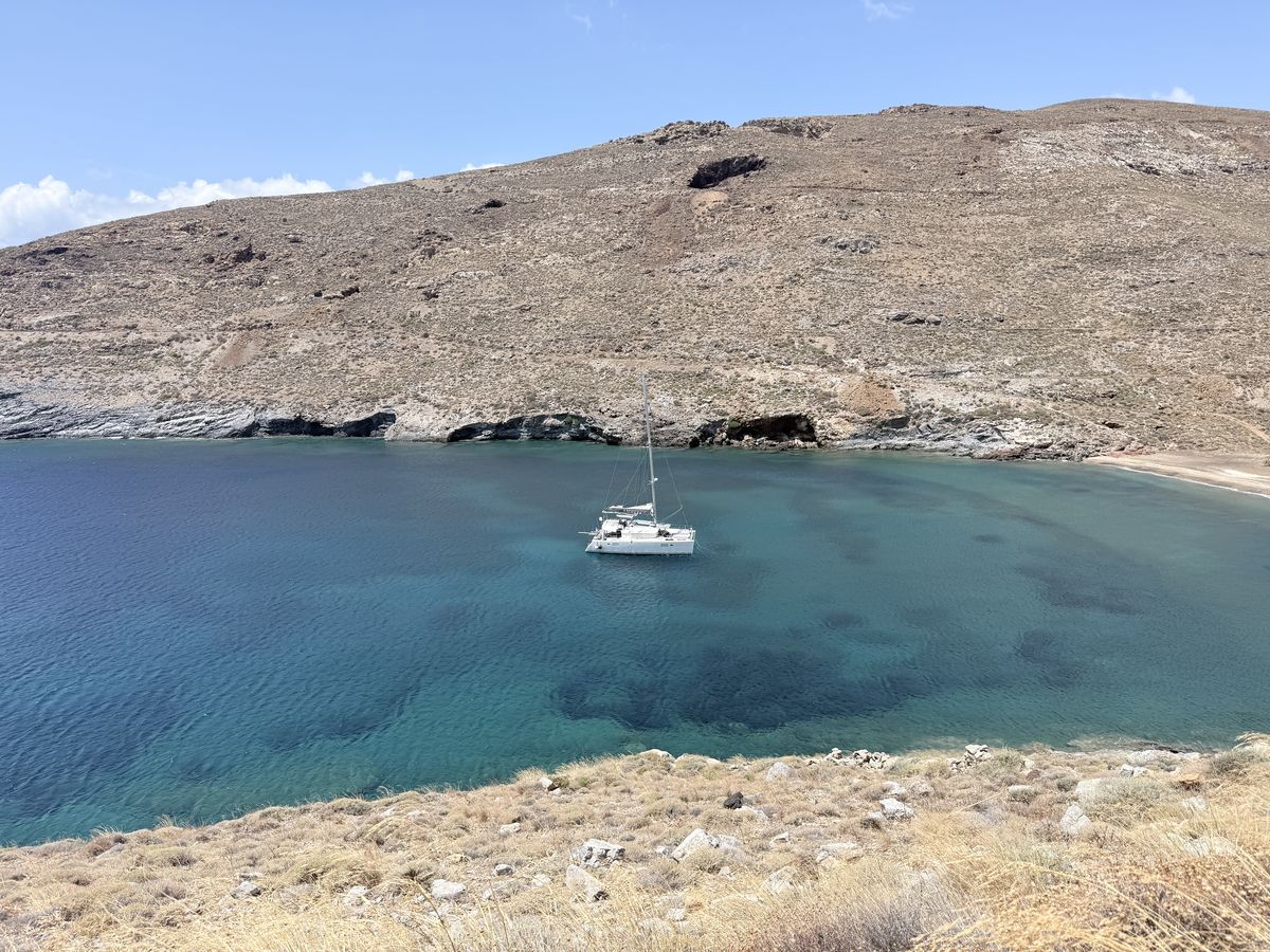 Catamaran anchored in a quiet bay
